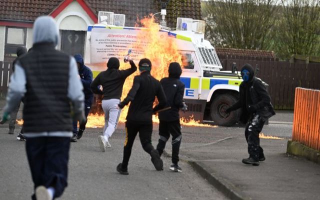April 10, 2023: A police vehicle is attacked with petrol bombs during an illegal dissident march in the Creggan area in Derry, Northern Ireland.