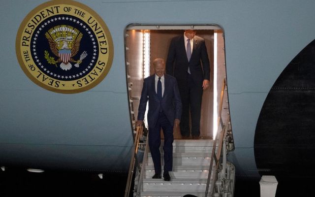 April 11, 2023: US President Joe Biden smiles as he exits Air Force One at RAF Aldergrove on April 11, 2023 in Co Antrim, Northern Ireland.