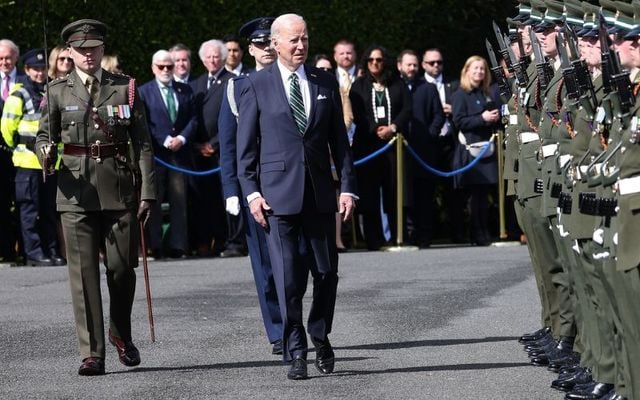 April 13, 2023: President Biden with Lieutenant Rory Behan as he inspects the Guard of Honour from the 7th Infantry Battalion at Cathal Brugha Barracks after meeting President Michael D Higgins and his wife Sabina at Áras an Uachtaráin in Dublin.