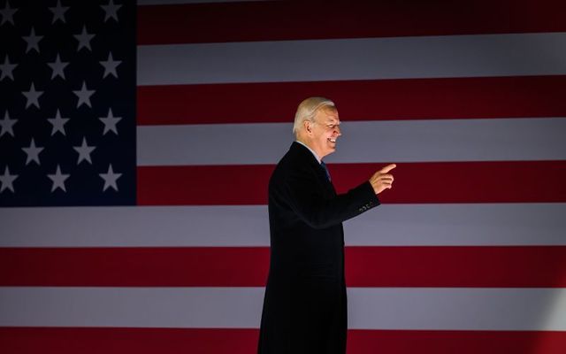 US President Joe Biden walks from the stage after addressing the crowd during a celebration event at St Muredach\'s Cathedral on April 14, 2023, in Ballina, Ireland.