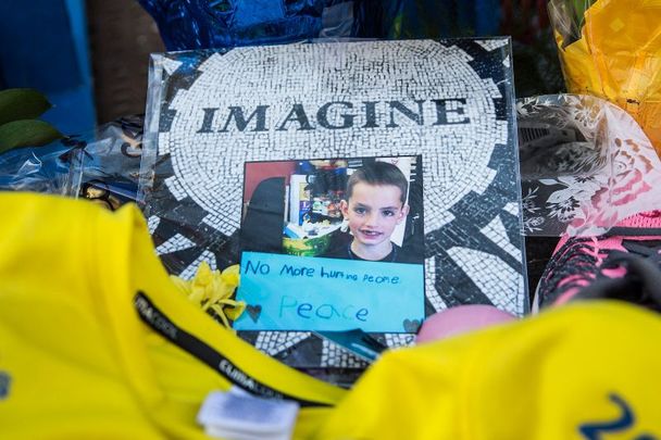 April 20, 2014: A photo of Martin Richard displayed near the finish line of the 2014 Boston Marathon in Boston, Massachusetts.