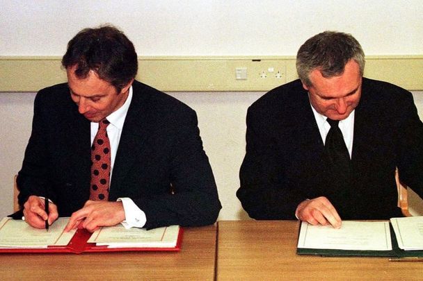 April 10, 1998: UK Prime Minister Tony Blair and Taoiseach Bertie Ahern sign the Good Friday Agreement.