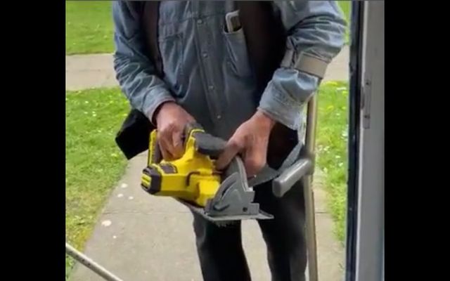 In a shocking video circulating online, a man believed to be a landlord is seen using a power tool to cut through a door and then lunge at his tenant.