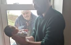 Photograph of Irish grandfather meeting grandson through window included in Netflix doc