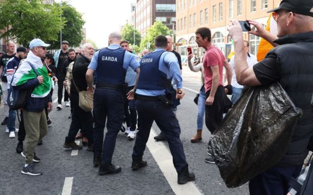 Protestors confront gardaí at an anti-immigration protest in Dublin on Saturday. 