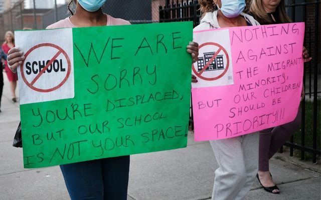 May 16, 2023: Residents, students, and parents gather for a protest in front of P.S. 188 in Coney Island which has recently begun housing asylum seekers in the school gym in New York City.