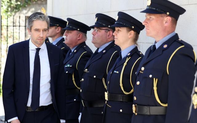 May 26, 2023: Minister for Justice Simon Harris inspects Gardaí at a ceremony to award Scott Medals for bravery in Walter Scott House, Dublin.