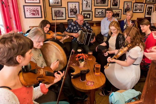 A music session in a Galway pub - an ideal setting for a rousing rendition of \"The Rattlin Bog!\"