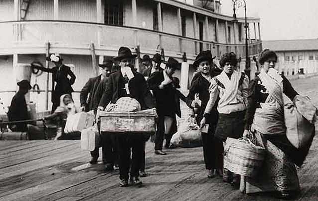 Emigrants arriving in New York through Ellis Island.