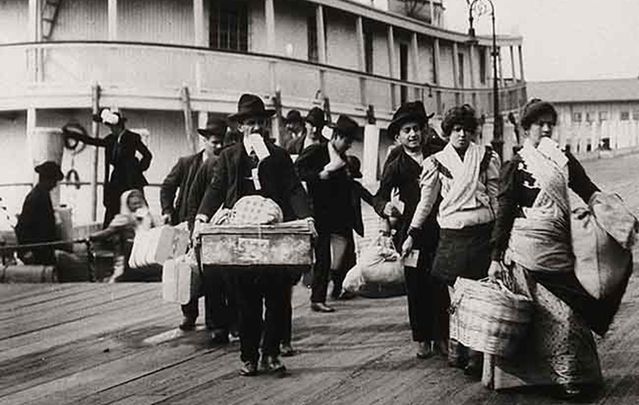 Emigrants arriving in New York through Ellis Island.