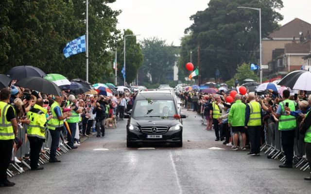 Mourners and Family gathered in Finglas to pay respect to singer/Songwriter Christy Dignam of Aslan who past away this week.