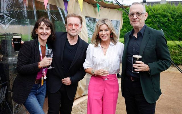 Bono, along with Andrea Catherwood and Tom Hanks enjoying a pint at Dalkey Books Festival, in south Dublin.