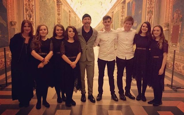 The Edge with the Irish teen choir that performed in the Sistine Chapel in 2016.