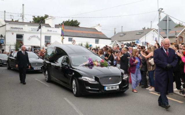 August 8, 2023: The hearse carrying Sinead O\'Connor\'s body passes by crowds of well-wishers and mourners lining the Bray seafront ahead of her funeral. 