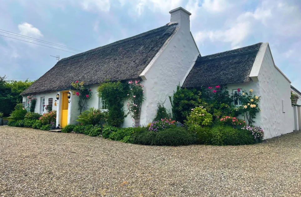 Seaside Irish thatched cottage with views of the Burren on the market