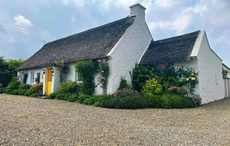 Seaside Irish thatched cottage with views of the Burren on the market