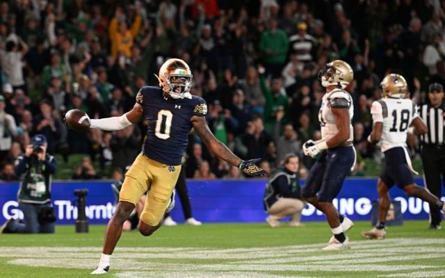 Deion Colzie #0 of the Notre Dame Fighting Irish celebrates a touchdown during the Aer Lingus College Football Classic game between Notre Dame and Navy at Aviva Stadium on August 26, 2023, in Dublin.