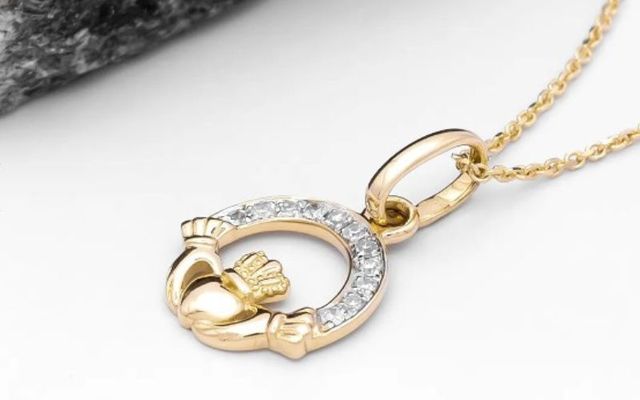 One lucky winner will receive a 14K gold diamond set Claddagh pendant 