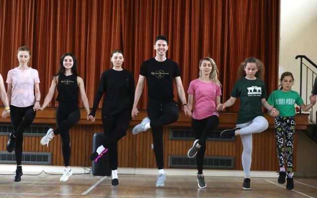 August 30, 2023: Kristina Bondarenko (centre), who learned Irish dancing in her native Odesa before fleeing the war, with two Riverdance performers, Emma Mannion and Jason O\'Neill, who helped her to teach her class at the Ukrainian Community Center in Rathmines, Dublin.