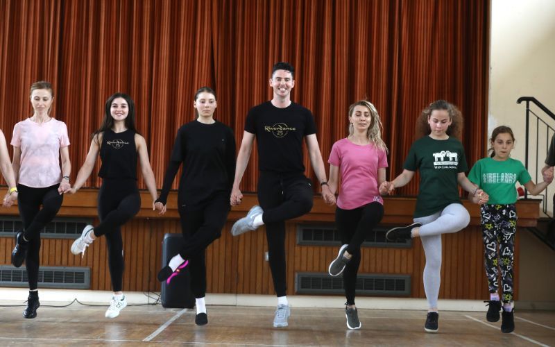WATCH: Riverdance pros share a step with Ukrainian refugees in Dublin
