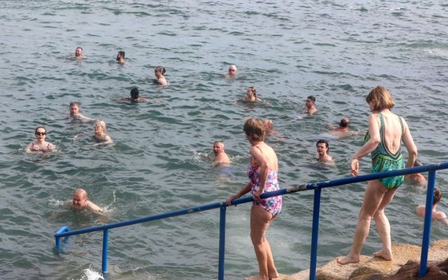 September 6, 2023: Swimmers enjoy the sunshine at the Forty Foot in Dublin during September\'s \"mini heatwave.\"