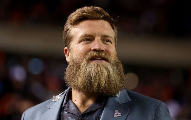 Former NFL quarterback and Thursday Night Football broadcaster Ryan Fitzpatrick looks on during the game between the Chicago Bears and the Washington Commanders at Soldier Field on October 13, 2022, in Chicago, Illinois