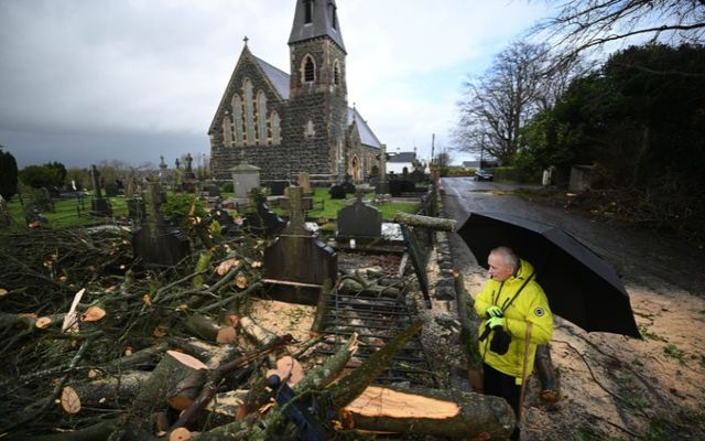 January 22, 2024: Damage caused by a fallen tree in the graveyard of St. Joseph\'s Church in Glenavy, Co Antrim.