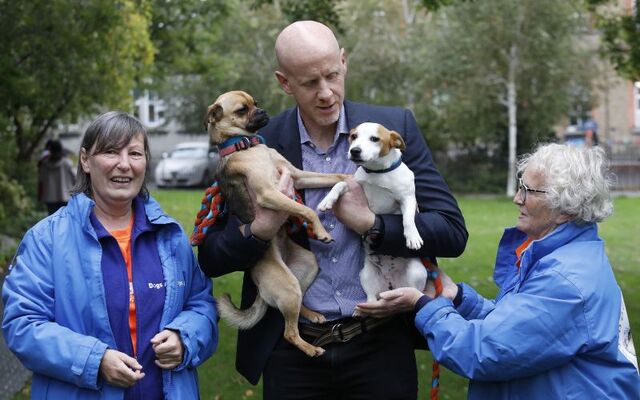 CEO of GoFundMe Tim Cadogen and volunteers from Dog\'s Aid Ireland at a launch last year.