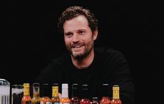 WATCH: Jamie Dornan chats free Irish pints - and punches - on “Hot Ones”