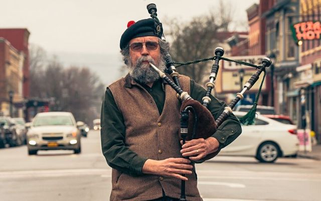 Steve Walker playing pipes at the World’s Shortest Saint Patrick’s Parade in 2023.