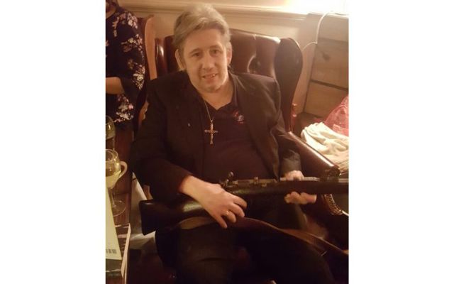 Shane MacGowan holding his beloved 1916 Easter Rising Lee-Enfield rifle.
