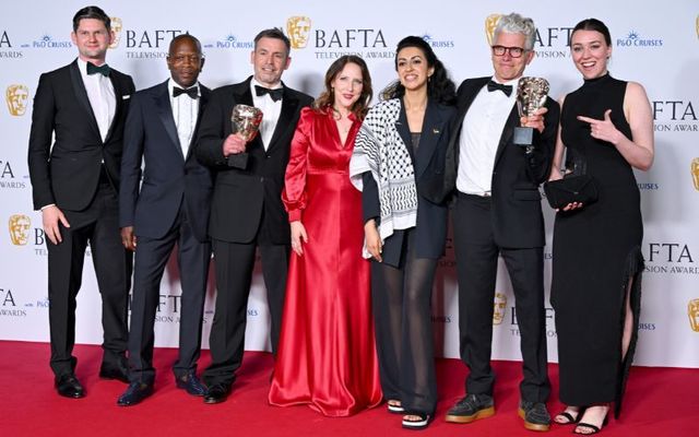 May 12, 2024: \"Top Boy\" producers Tina Pawlik (fourth right) and Alisdair Flind (sixth right) along with the production crew, pose with the Drama Series Award at Sunday night\'s BAFTA TV awards. 