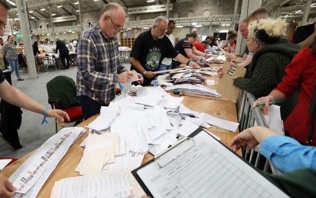 June 8, 2024: Staff empty the ballot boxes as they start counting the ballot papers for the Local and European elections in the RDS Dublin. 