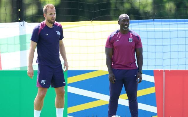Euro 2024: Harry Kane of England and coach Jimmy Floyd Hasselbaink look on during a training session at Spa & Golf Resort Weimarer Land on July 09.