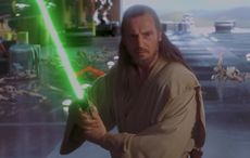 Liam Neeson’s “Star Wars” lightsaber among movie props going to auction