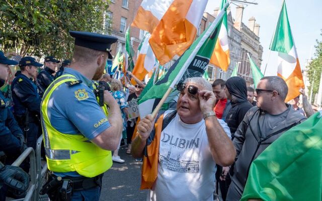September 19, 2024: Members of the Gardai and the Public Order Unit keep the peace as anti-racist and anti-immigrant protestors gather at the junction of Grafton Street and Nassau Street.