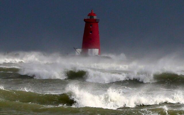 Heavy rain and gales hit Poolbeg Lighthouse in Dublin in 2017.
