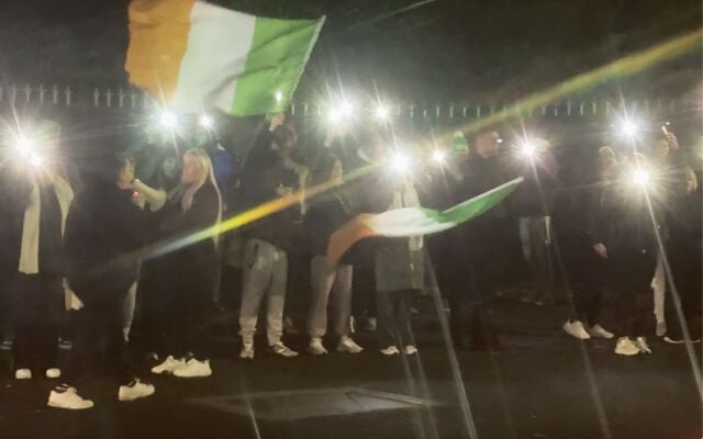  Peaceful protestors holding their phone flashlights up in respect of the little girl who was sexually assaulted earlier this week outside the Citywest Hotel and IPAS Centre.
