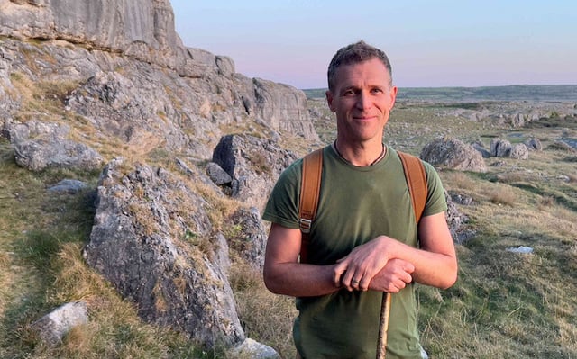 Presenter Eoin Warner on a Karst Landscape in TG4\'s new series \"Oileán Glas, Fásach Bán.\"