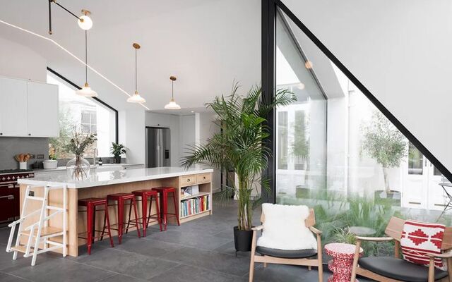 The kitchen and atrium of Nick Drew and Lynn Clarke\'s home in Wicklow.