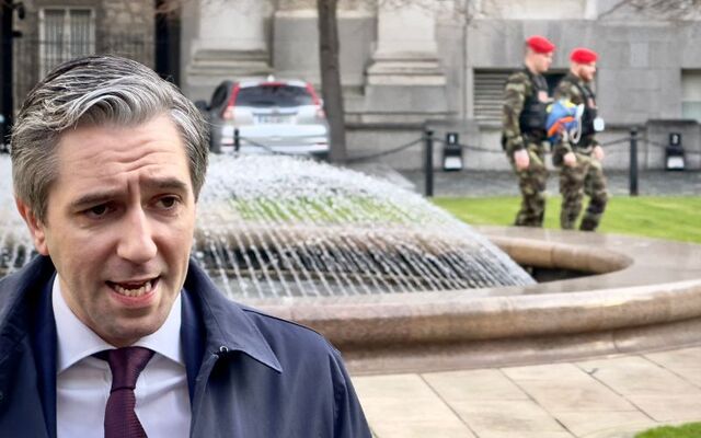 March 4, 2025:  Tánaiste Simon Harris before a Cabinet meeting at Government Buildings. In the background are armed members of the Irish Defence Forces. 
