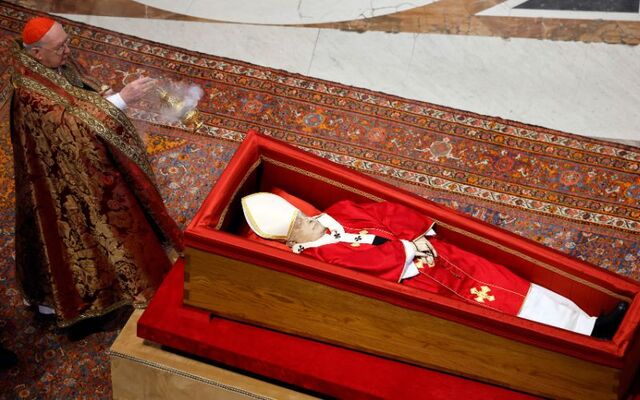April 23, 2025: Dublin native Camerlengo Kevin Farrell holds incense next to Pope Francis\' coffin at the Basilica at St Peter’s Square in Vatican City, Vatican.