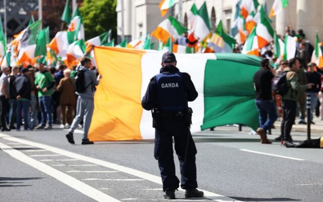 April 26, 2025: A member of the Garda Public Order Unit watching on at the protest in Dublin.