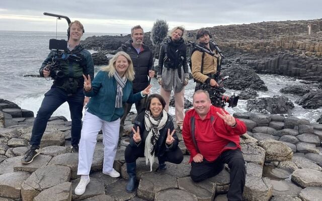 Mickela Mallozzi, host of US travel show ‘Bare Feet with Mickela Mallozzi’ (front, second right) and crew, during filming at the Giant’s Causeway; also pictured is Ruth Moran, Tourism Ireland (second left).