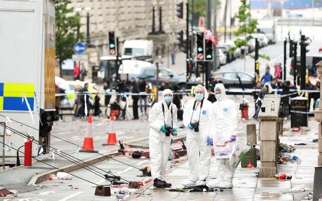 May 27, 2025: Crime Scene Investigators at the scene on Water Street in Liverpool, England, the day after a car ploughed into a crowd gathered for the Liverpool F.C. victory parade.