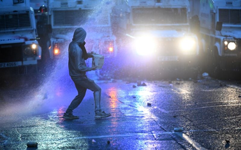 Hatchet thrown at police during third night of "unacceptable" disorder in Northern Ireland