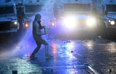 Hatchet thrown at police during third night of "unacceptable" disorder in Northern Ireland