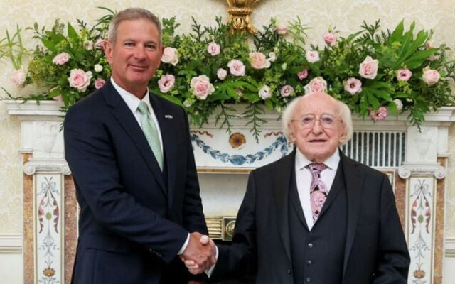 July 1, 2025: US Ambassador to Ireland Edward Walsh (L) shakes hands with President of Ireland Michael D Higgins following a ceremony in Áras an Uachtaráin.