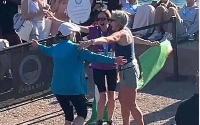 Irish women reuniting after taking part in the Sydney marathon.