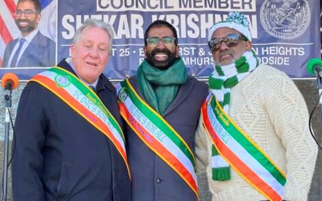 Daniel Dromm, Council Member Shekar Krishnan, and St. Pat’s for All Co-chair Archley Prudent on stage before the start of the 2025 St. Pat’s for All Parade.